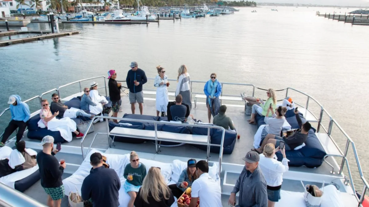 Open party deck of the 90-foot custom catamaran set up for a large celebration in Banderas Bay
